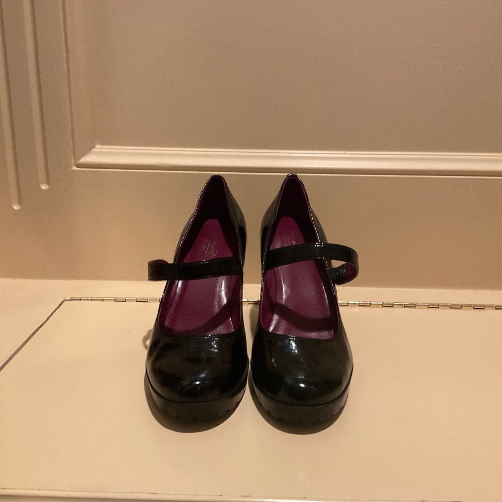 High heeled Coach Shoes